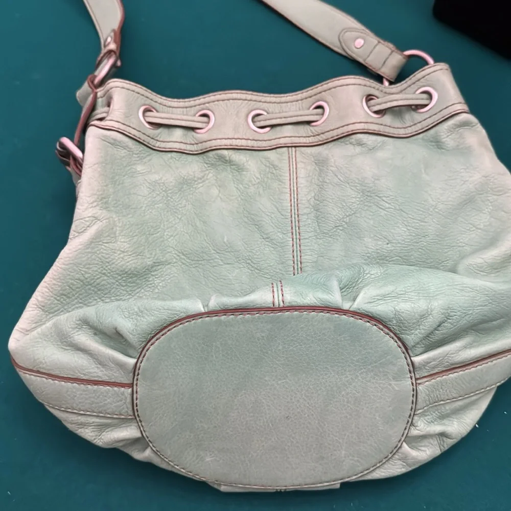 Fossil mint green vintage hobo” bag. Such a cool 60’s color!! No 🔐😞 (OLCC)